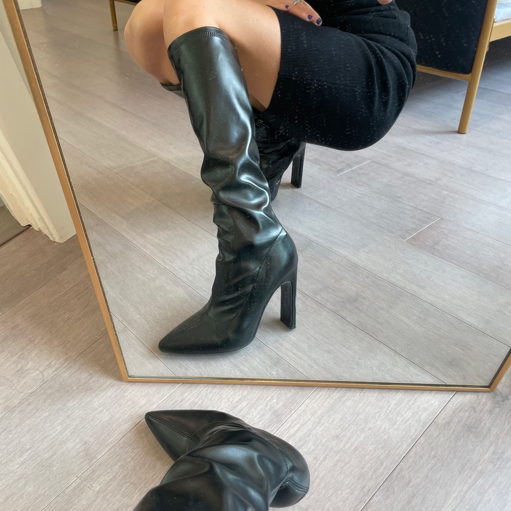 Brand new black boots. Size 36.
